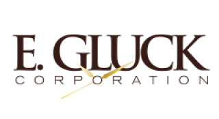 E GLUCK CORPORATION